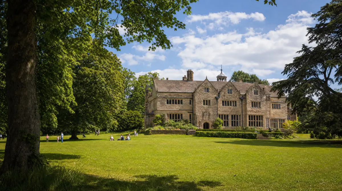 A historic hall and parkland in East Lancashire on a bright summer day